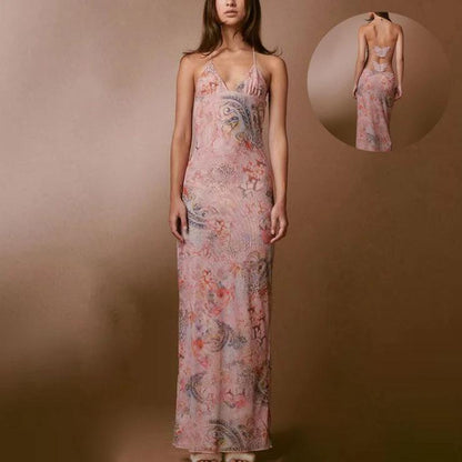 Mandotos floral print halter dress with butterfly back and spaghetti straps, perfect for summer or casual occasions.