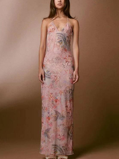 Mandotos floral print halter dress with butterfly back and spaghetti straps, stylish and perfect for summer occasions.