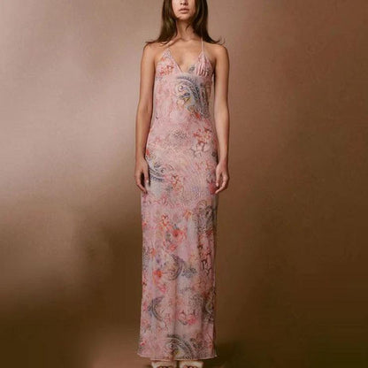 Mandotos floral print halter dress with spaghetti straps and butterfly back design, perfect for summer or casual occasions.
