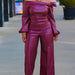Mandotos Glamourista women's trendy leather suit showcasing chic, confident style with tailored design and sleek black leather.