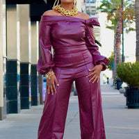 Mandotos Glamourista women's trendy leather suit, stylish and chic, featuring a fitted blazer and matching trousers for confident fashion.