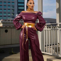 Mandotos Glamourista women's trendy leather suit, stylish and confident, shown in a chic, modern fashion pose.