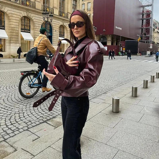 Mandotos women's loose lapel leather jacket with cropped design, stylish streetwear top, black leather fashion for women.