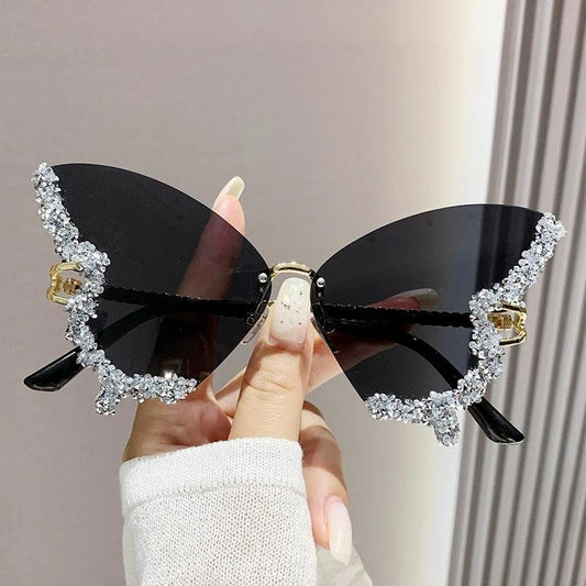 Mandotos luxury diamond butterfly sunglasses for women, Y2K vintage rimless oversized eyewear with stylish shades and unique design.