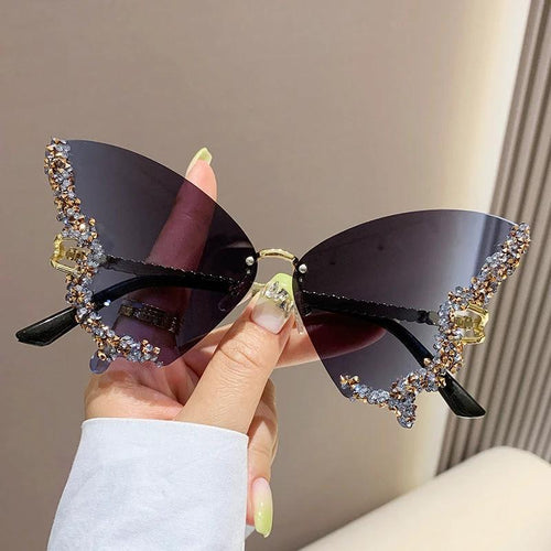 Mandotos luxury diamond butterfly sunglasses for women, Y2K vintage rimless oversized eyewear with stylish shades.