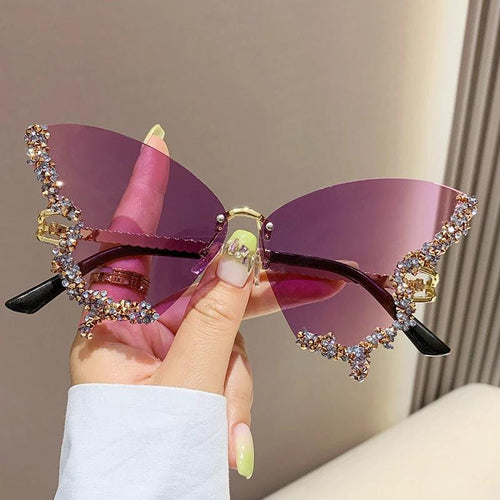 Mandotos luxury diamond butterfly sunglasses for women, Y2K vintage rimless oversized sun glasses with stylish eyewear shades.