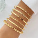 Mandotos bohemian metal chain bracelet set for women with geometric gold-tone thick link bangles, six-piece jewelry set.