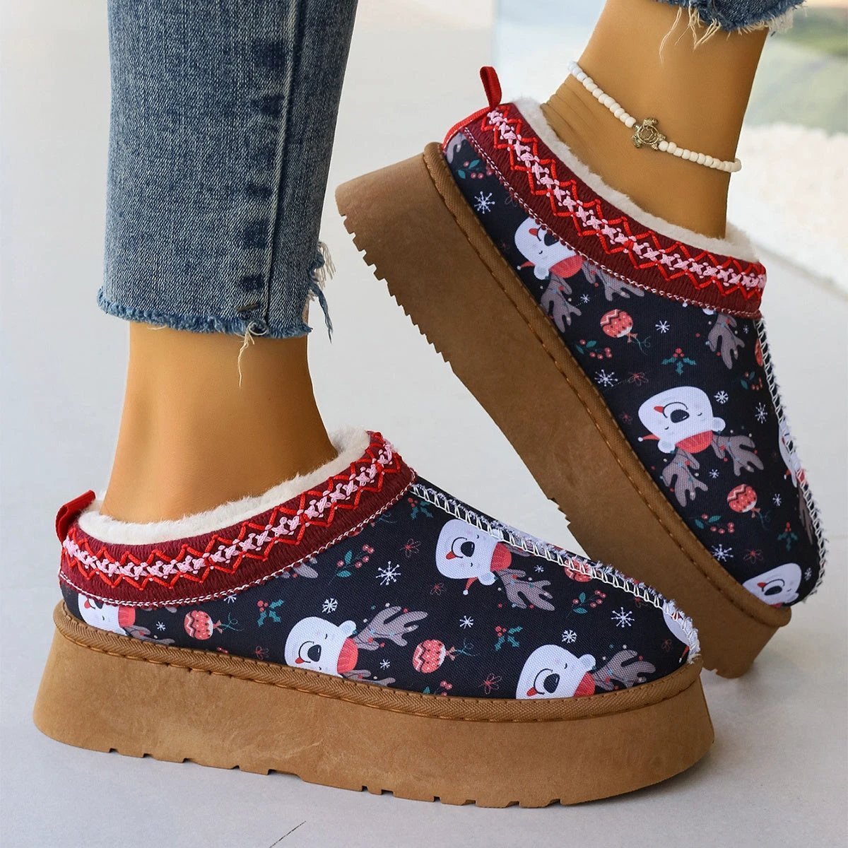 Mandotos navy Christmas cartoon print plush-lined slip-on ankle boots for women, indoor home shoes with cozy comfort.