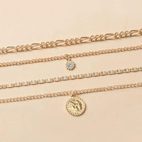 Mandotos chunky gold layered necklace with coin pendant and sun charm for women, featuring bold and stylish jewelry design.