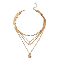 Mandotos chunky gold layered necklace with coin pendant and sun charm, designed for women, featuring bold, stylish jewelry.