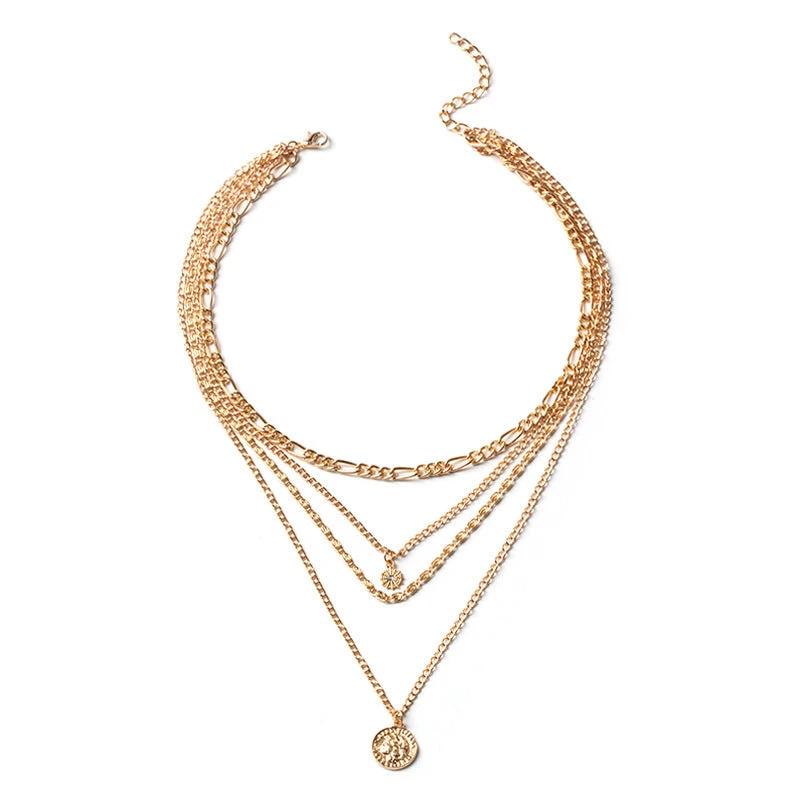 Mandotos chunky gold layered necklace with coin pendant and sun charm, designed for women, featuring bold, stylish jewelry.