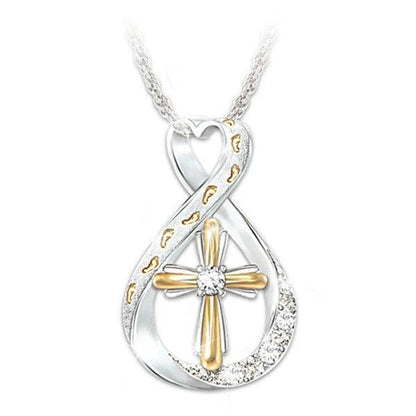 Mandotos Two Tone Cross Footprint Diamond Pendant Necklace featuring a detailed cross and footprint design.