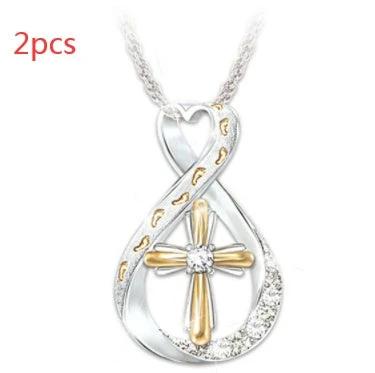 Mandotos Cross Footprint Diamond Pendant necklace with two-tone metal, showcasing a detailed cross and footprint design.