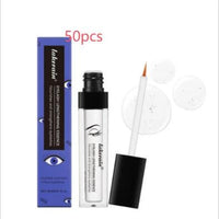Mandotos eyelash growth serum in a clear liquid bottle, designed to nourish, strengthen, and promote thick, curly lashes.