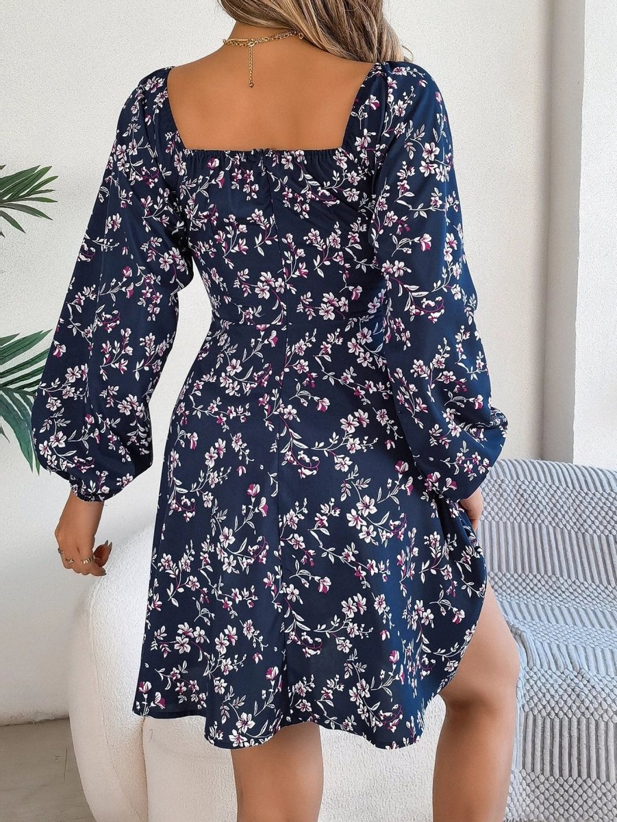 Mandotos floral print red lantern sleeve dress with square neck, tie waist, and long A-line silhouette.
