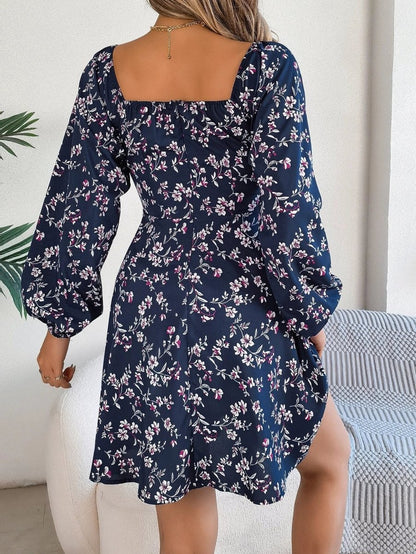 Mandotos floral print red lantern sleeve dress with square neck, tie waist, and long A-line silhouette.