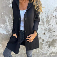 Red hooded cardigan by MANDOTOS, single-breasted loose-fit jacket with front buttons and cozy hood for casual wear.