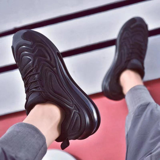 Mandotos men's casual black air cushion sneakers with breathable design, lace-up closure, ideal for outdoor running and sports activities.