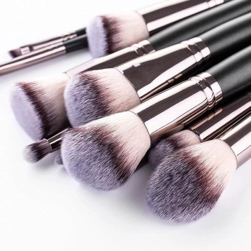 Matte black MANDOTOS makeup brush set with 15 essential brushes for flawless makeup application, displayed with brushes arranged neatly.