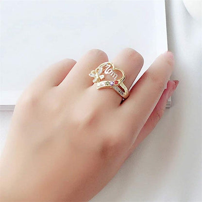 Mandotos Mother's Day gift ring with hollow heart design, rhinestones, butterfly accents, featuring English letter love for mom.