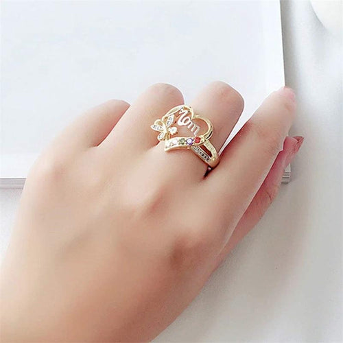 Mandotos Mother's Day gift ring with hollow heart design, rhinestones, butterfly accents, featuring English letter love for mom.