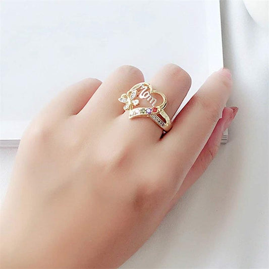 Mandotos Mother's Day gift ring with hollow heart design, rhinestones, butterfly accents, featuring English letter love for mom.