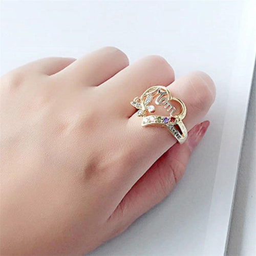 Mandotos Mother's Day gift ring featuring a hollow heart, rhinestones, butterfly design, English letter love motif, jewelry accessory.
