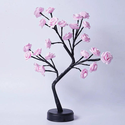 Mandotos Rose Flower Tree Table Lamp with USB fairy night light on a desk, decorative floral design for cozy lighting.