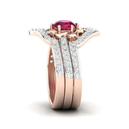 Rose gold flower ring from MANDOTOS, featuring an elegant engagement and wedding band set with detailed floral design.