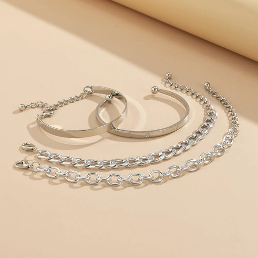 Mandotos C-shaped hollow chain bracelet set featuring simple, smooth design with multiple silver-toned bracelets on a white background.