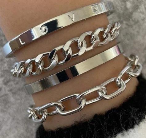 Mandotos C-shaped hollow chain bracelet set featuring simple, smooth design with multiple bracelets for a stylish accessory ensemble.