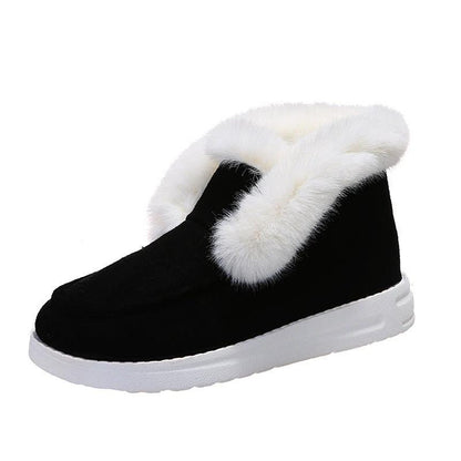Mandotos warm winter snow boots for women with plush fur lining and ankle height, designed for cold weather.