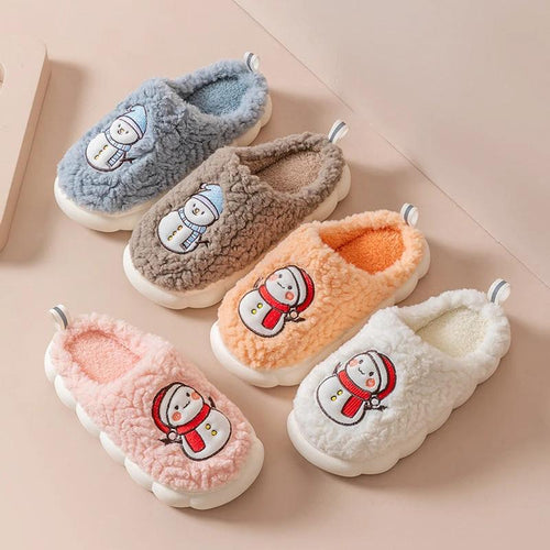 Pair of MANDOTOS snowman slippers with plush lining and anti-slip soles, designed for cozy winter indoor wear for couples.