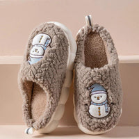 Mandotos snowman slippers for winter, plush cozy home shoes with anti-slip soles for couples, featuring festive snowman design.