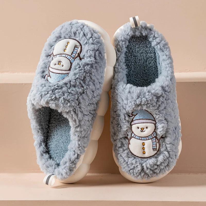 Pair of MANDOTOS Snowman Slippers featuring plush material and anti-slip soles, perfect for cozy winter home wear for couples.