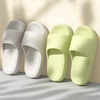 Mandotos solid thick-soled home slippers for women and men, summer non-slip bathroom and house shoes on a neutral background.