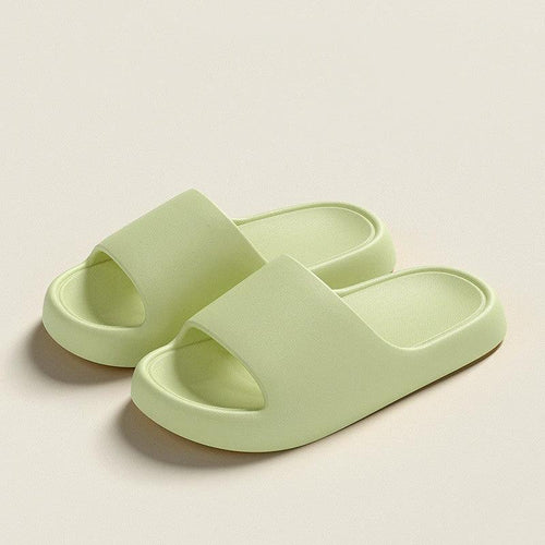 Mandotos solid thick-soled home slippers for women and men, summer non-slip bathroom house shoes on a tiled floor.