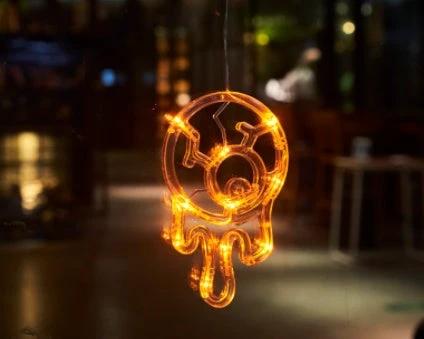 Mandotos Halloween LED window lights featuring spooky pumpkin, spider, and ghost designs for festive Halloween decoration.