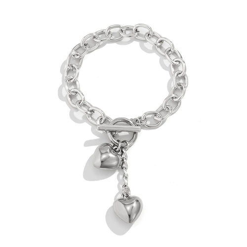 Mandotos thick chain necklace with lock and key pendant, trendy fashion jewelry piece showcasing bold design and metallic finish.