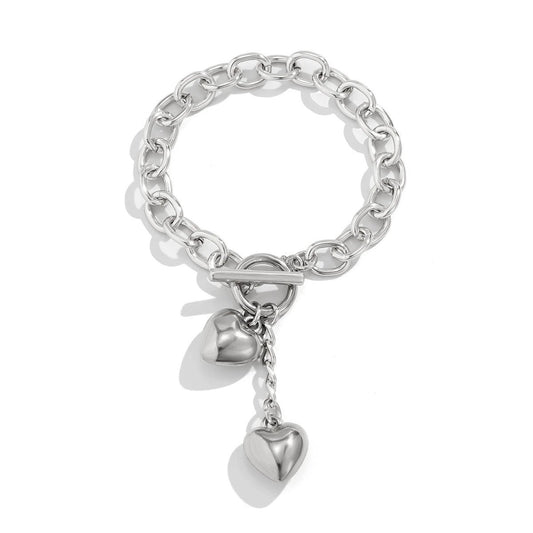 Mandotos thick chain necklace with lock and key pendant, trendy fashion jewelry piece showcasing bold design and metallic finish.