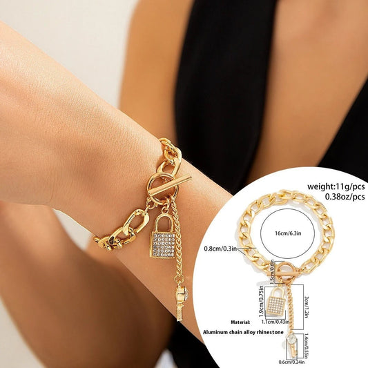 Mandotos thick chain lock and key pendant necklace featuring bold, trendy fashion jewelry with a stylish metallic design.