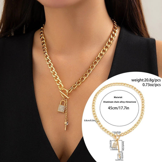 Mandotos thick chain lock and key pendant necklace with trendy fashion jewelry style, featuring a bold metal chain and decorative pendant.