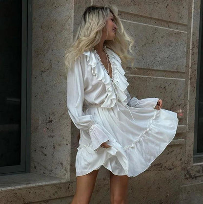 Mandotos V neck pleated ruffle dress with Y2K style, short length, flared sleeves, and feminine design.