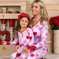 Matching Valentine's Day love print pajamas for parent and child by MANDOTOS, featuring cozy, festive sleepwear with love-themed designs.