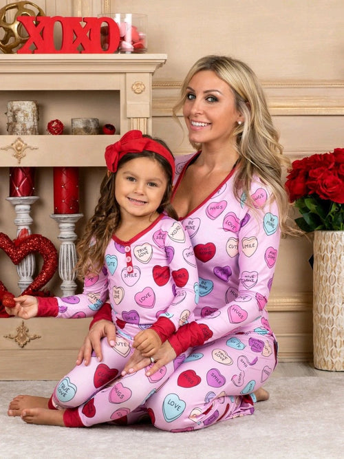 Matching Valentine's Day love print pajamas for parent and child by MANDOTOS, featuring cozy, festive sleepwear with love-themed designs.