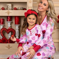 Matching Valentine’s Day love print pajamas for parent and child by MANDOTOS, featuring cozy, festive sleepwear sets.