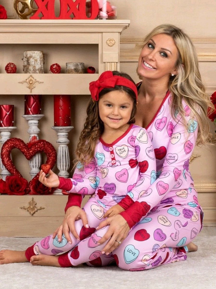 Matching Valentine’s Day love print pajamas for parent and child by MANDOTOS, featuring cozy, festive sleepwear sets.