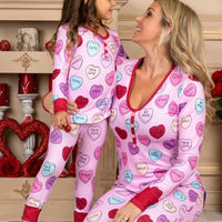 Matching Valentine's Day love print pajamas set for parent and child by MANDOTOS, featuring cozy, festive holiday sleepwear.