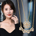 Mandotos four-leaf clover necklace made of titanium steel with a light, luxury finish and non-fading design.
