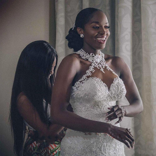 Mandotos vintage lace beaded mermaid wedding dress with sheer neckline and intricate detailing, perfect for bridal occasions.